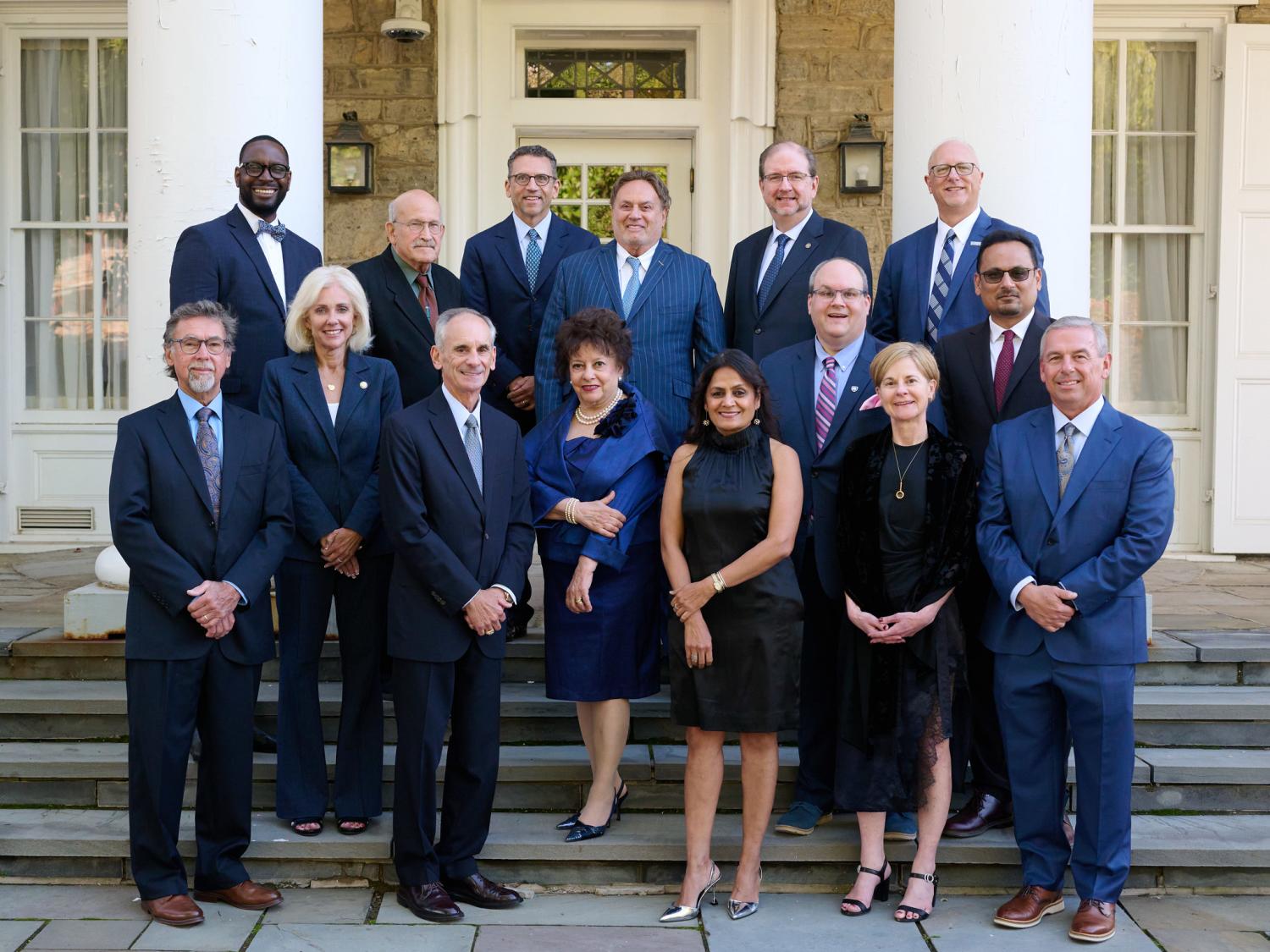 Fifteen award recipients of the 2026 Alumni Fellow Award gather for a group photo.