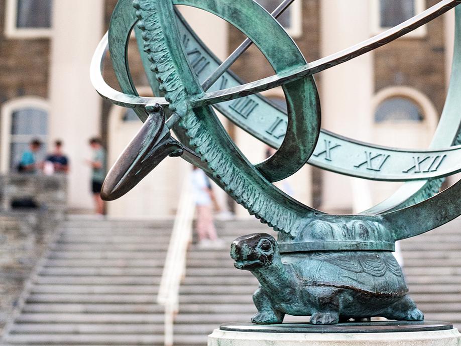 the Armillary sphere on the Old Main patio, depicting a turtle with rings on its back