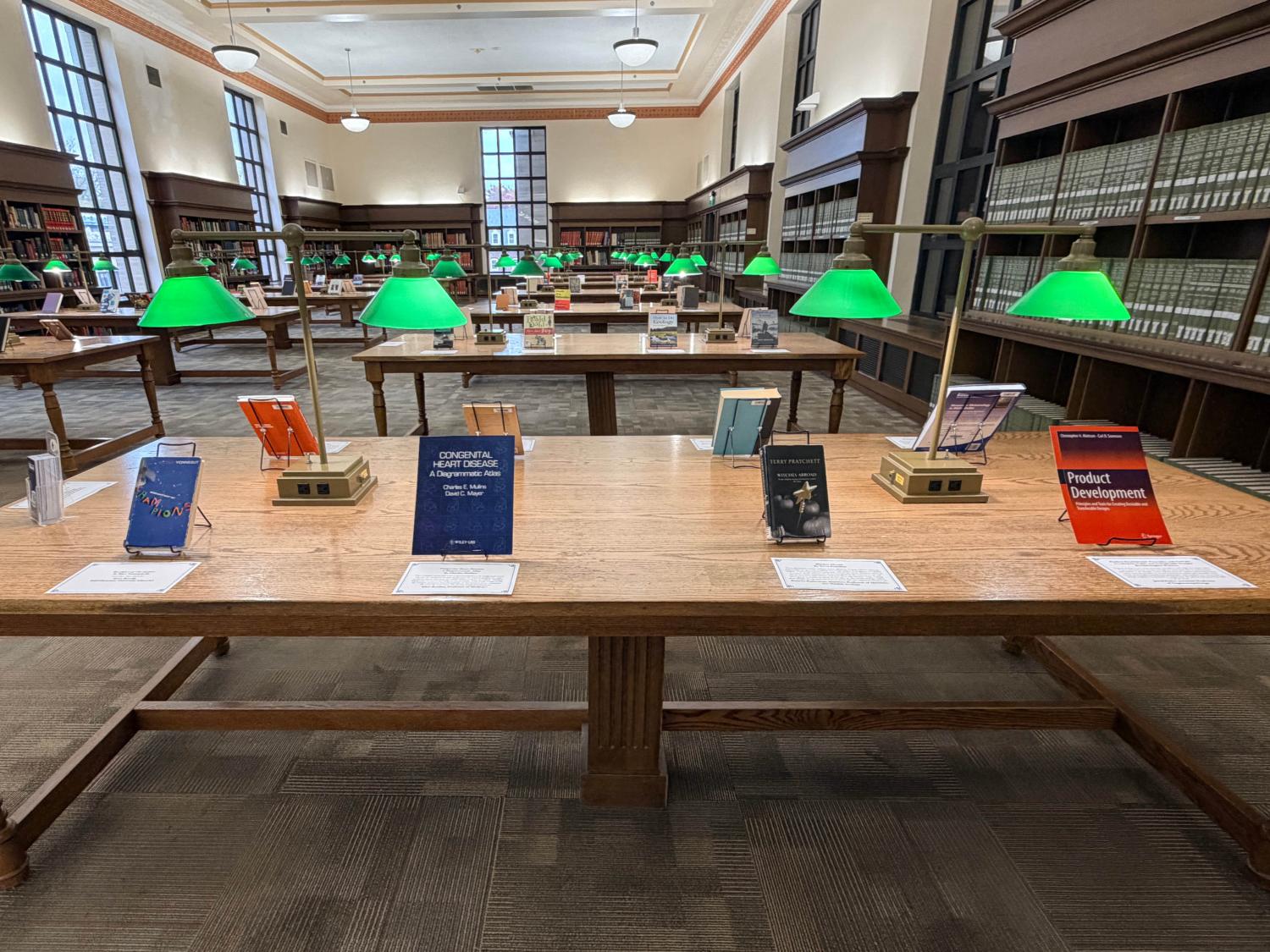 A table in Patee Library showcasing books on display