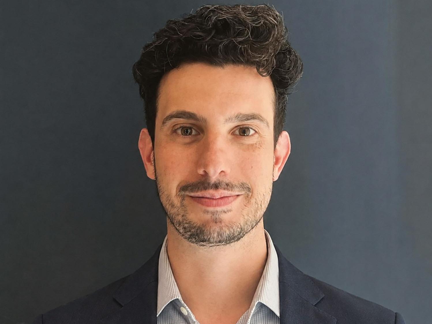 A head and shoulders photo of Gregory Maugeri