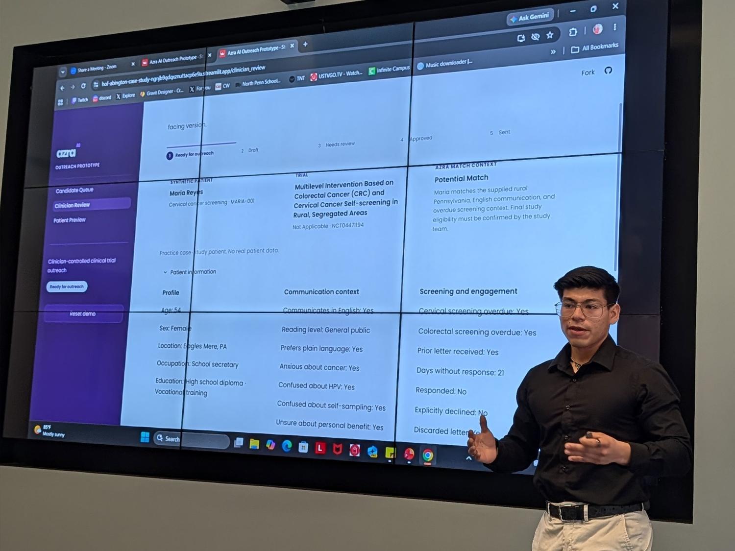man standing in front of monitor