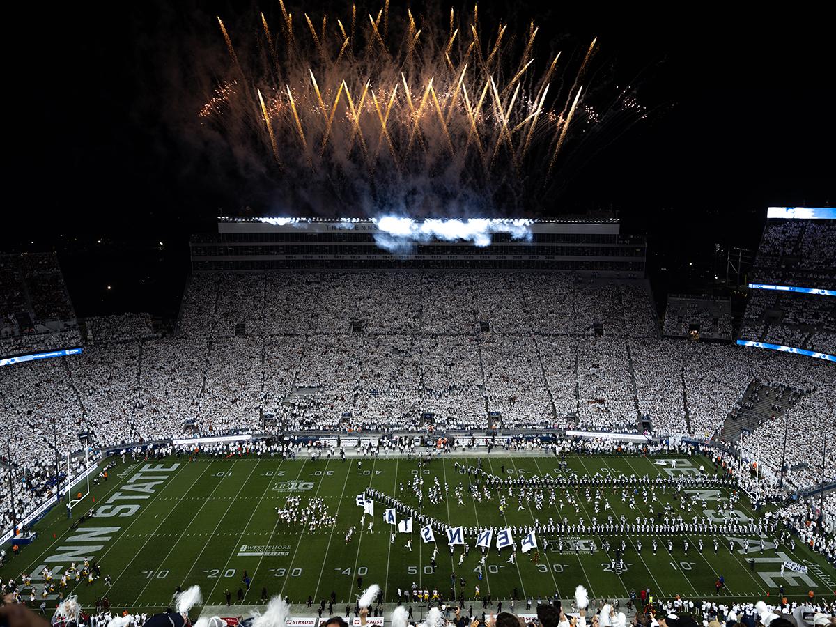 Wide shot of stadium with fireworks