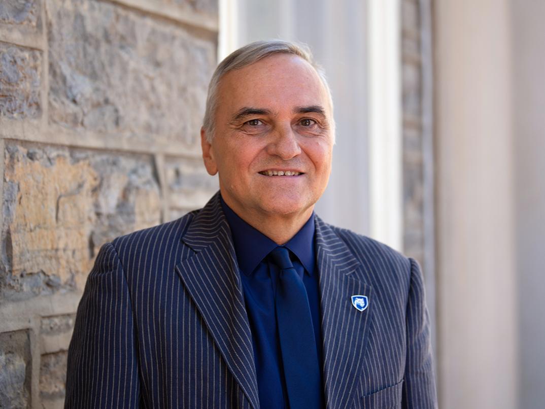 A headshot image of Penn State faculty member Frantisek Marko outside of Old Main.