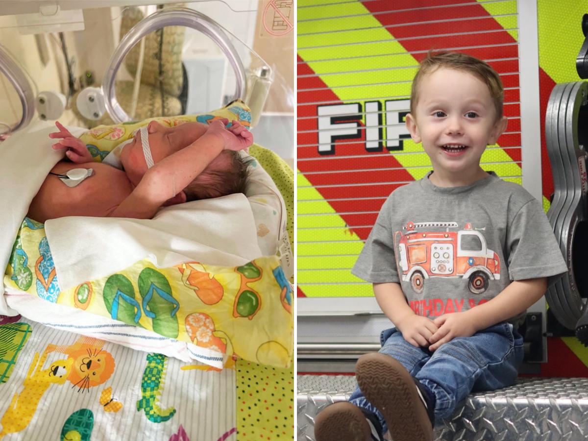 A baby is in an incubator in a neonatal intensive care unit with a breathing tube and a heart monitor.