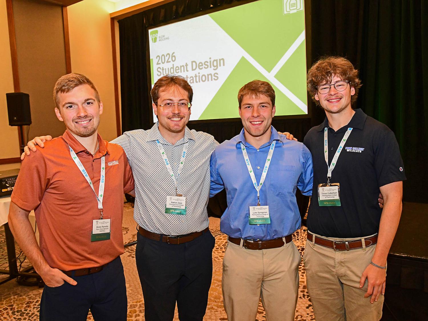 Four students pose for the camera.