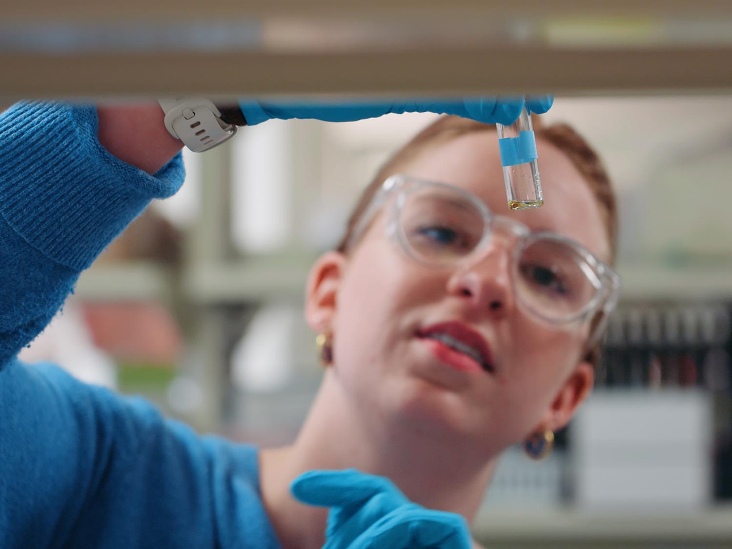 Chemistry graduate student Amanda Gramm examines a sample during her assistantship in the 2025-26 academic year