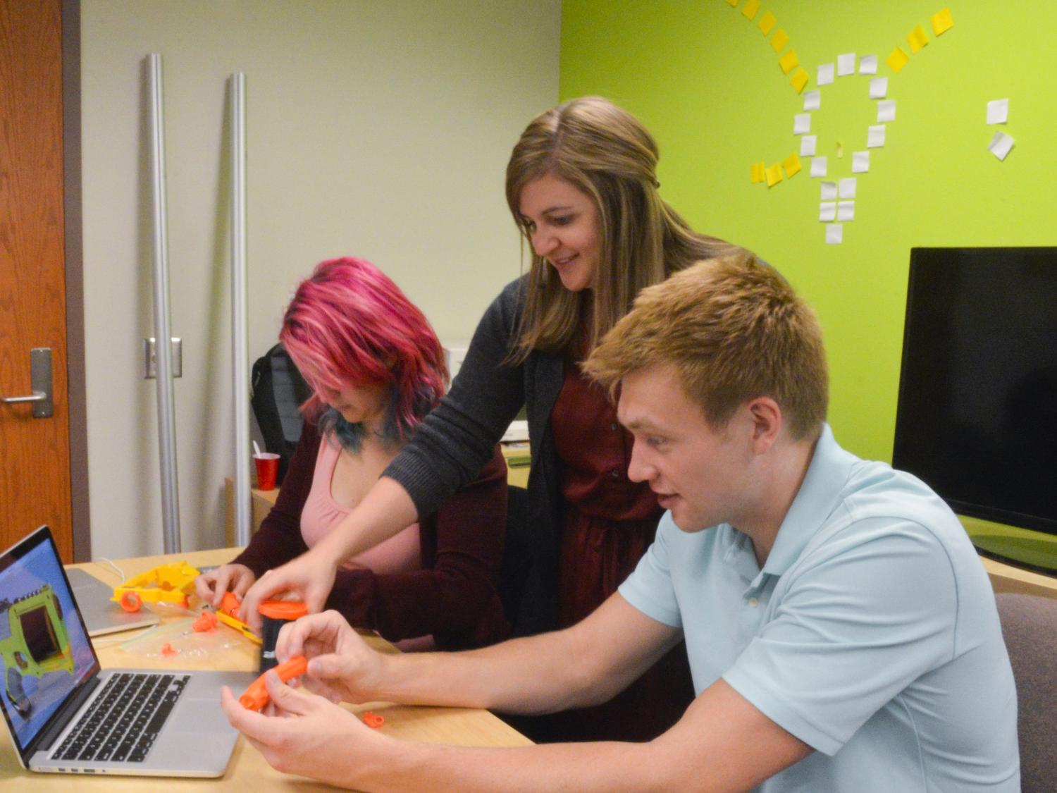 Assistant Professor Scarlett Miller, Clayton Meisel and Elizabeth Starkey discuss how to illustrate the complexity of the physical product through a virtual user-interface.