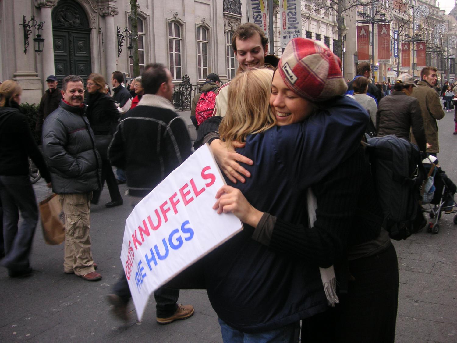 People participating in the Free Hugs campaign