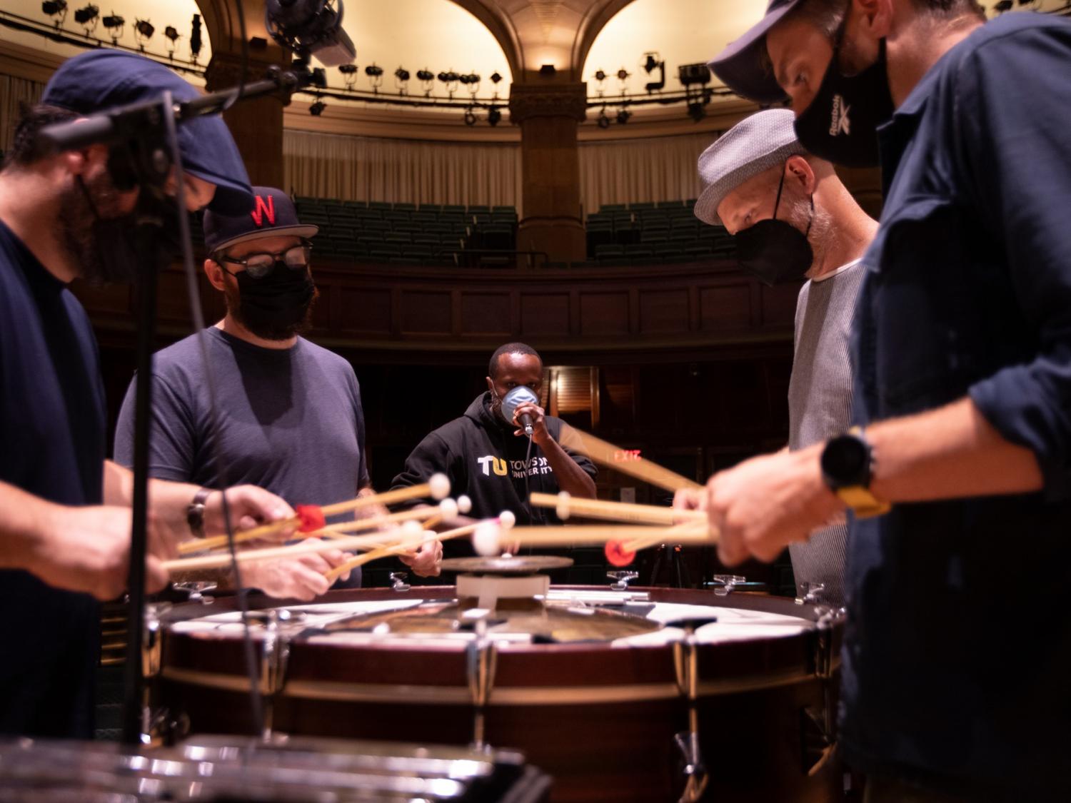 Dominic Shodekeh Talifero, at center, beatboxes with the ensemble So Percussion