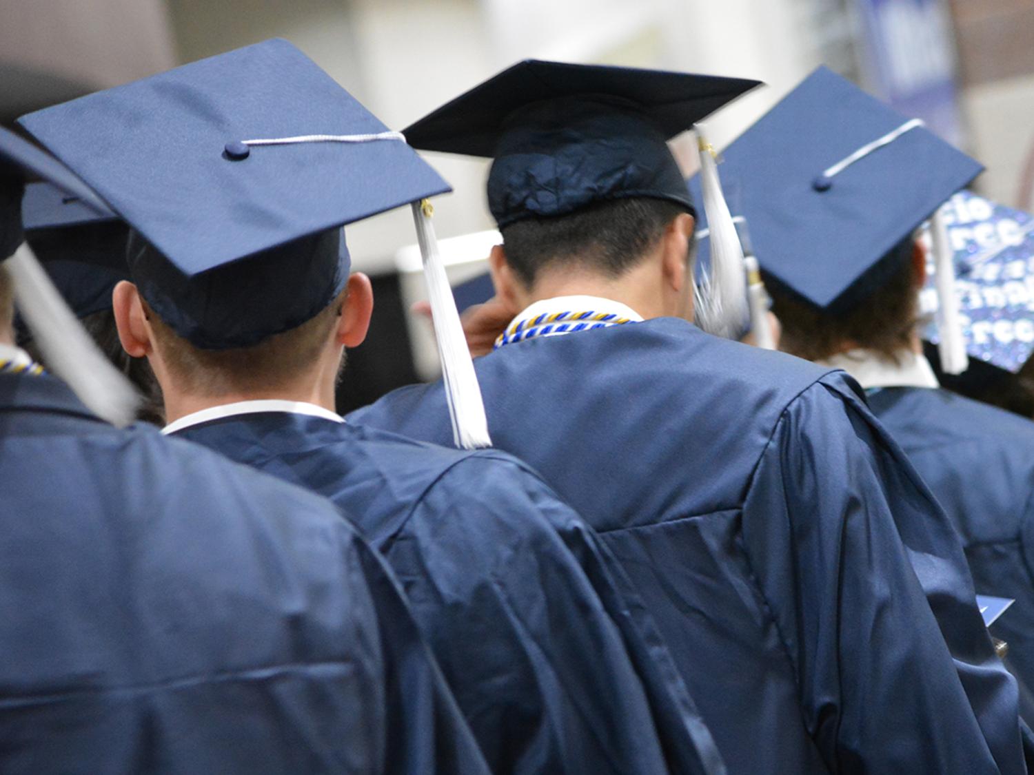 graduates in caps and gowns