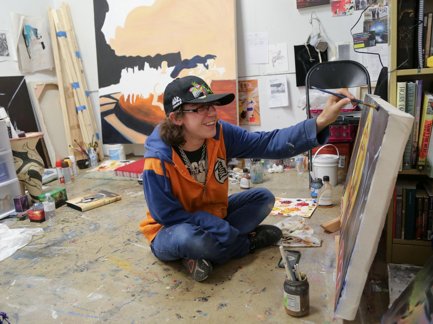 Taylor Bielecki paints in her studio. 