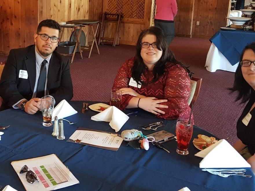 Students at a networking event in 2019