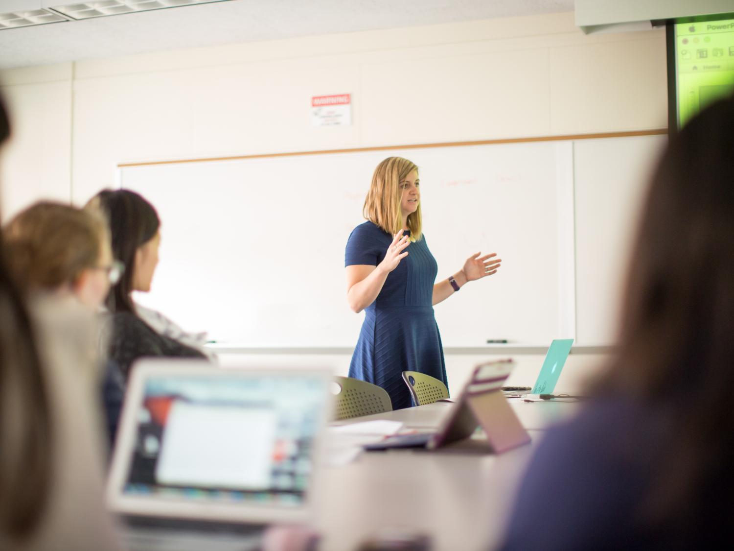 Scarlett Miller speaks to students in classroom