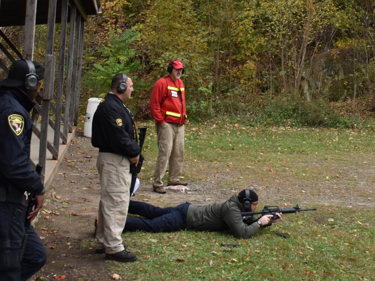 Constable Rocky Younkin (standing, right), an instructor with the CCPS, trains Wilkinsburg Police Officers Brandon Rourke, (laying), Doug Yuhouse (center), and William Coffee (left) to become certified as patrol rifle instructors.