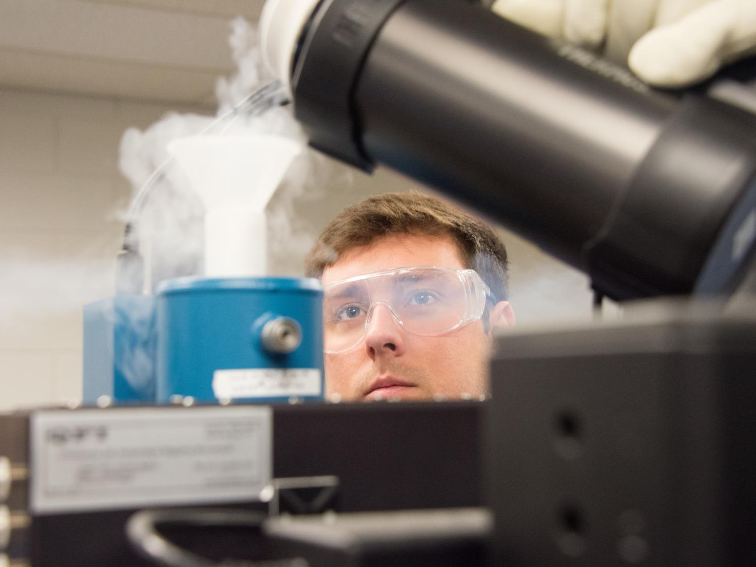 James Spencer Lundh, a graduate student studying mechanical engineering, uses liquid nitrogen.