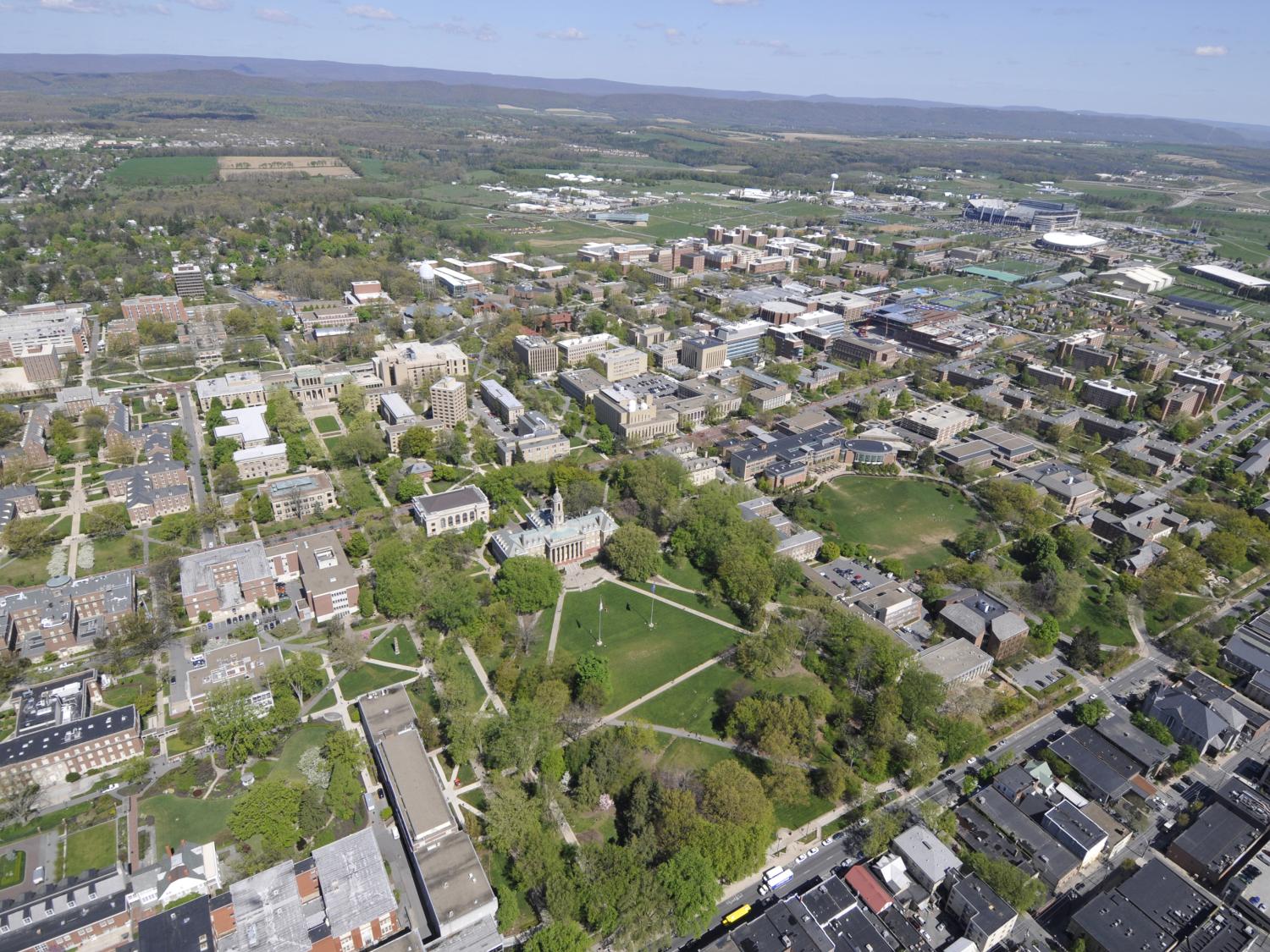 An aerial view over Penn State's University Park campus and State College