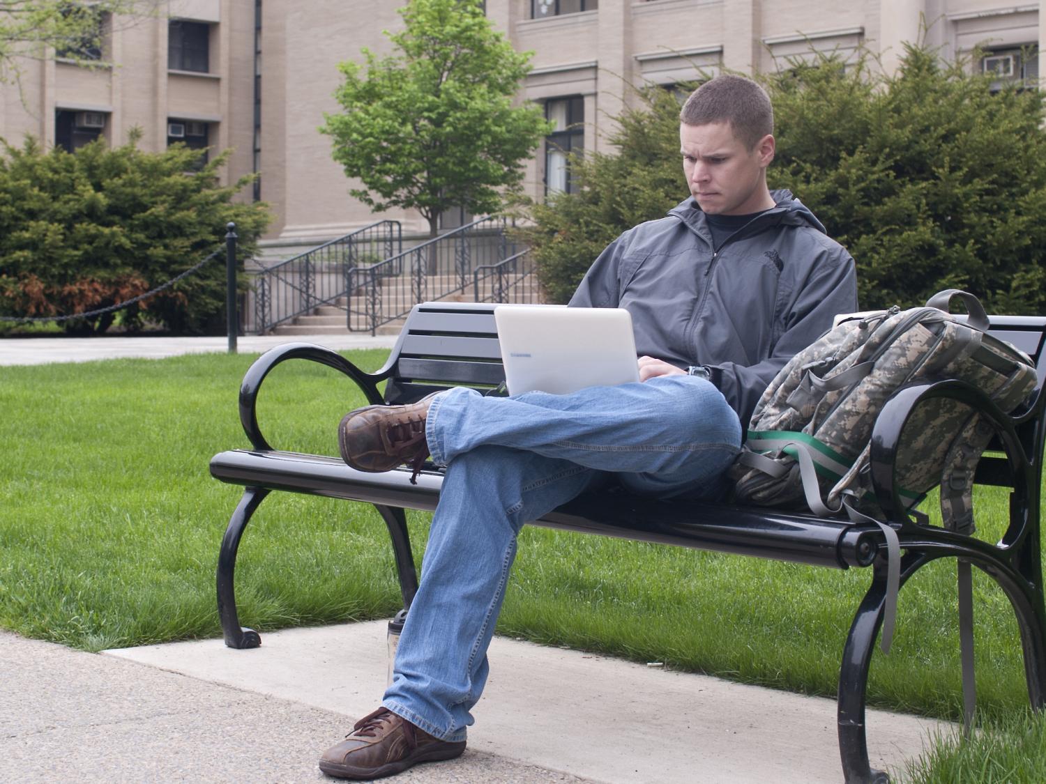 Student studying outside Burrowes