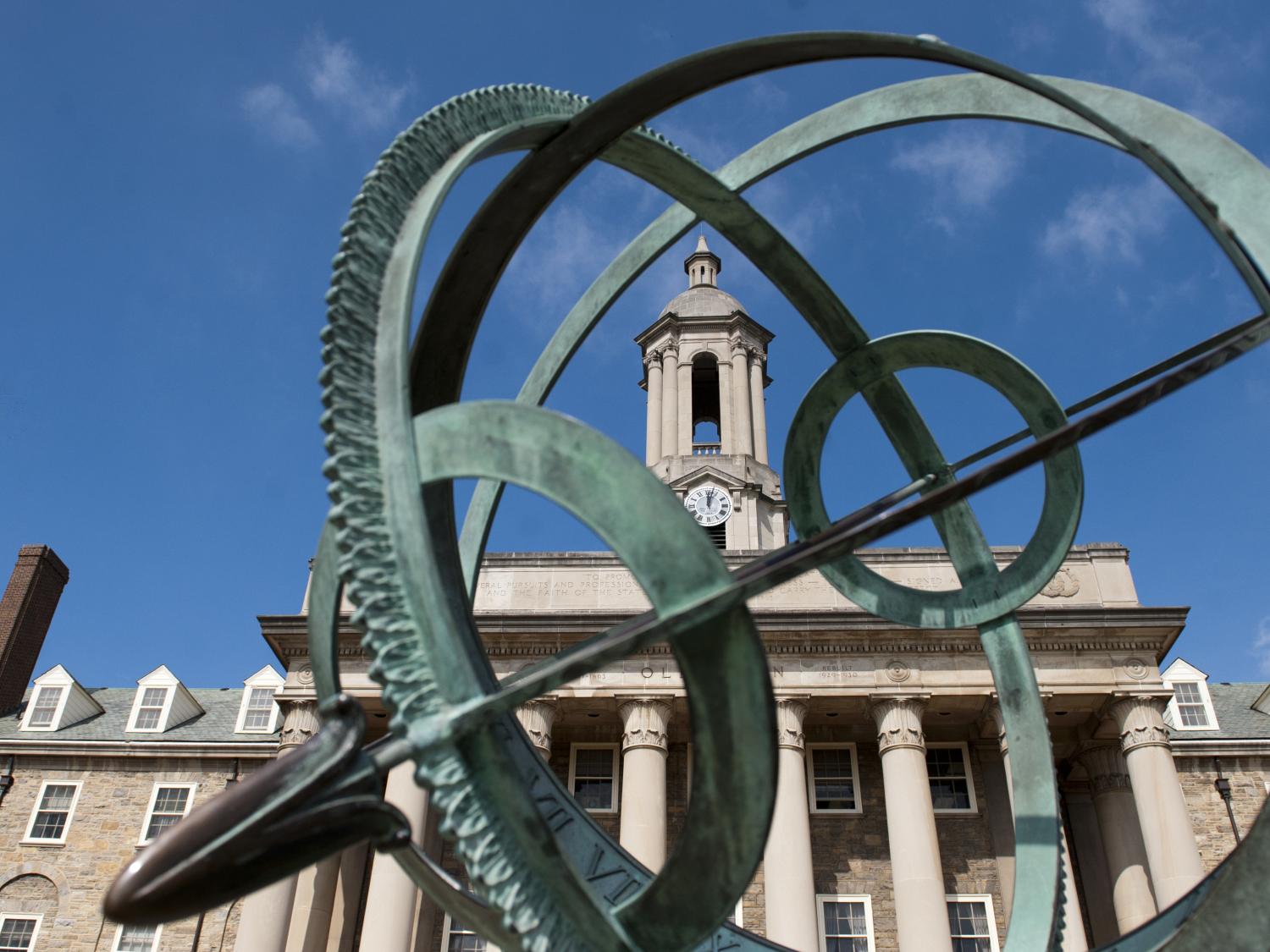 Old Main blue skies