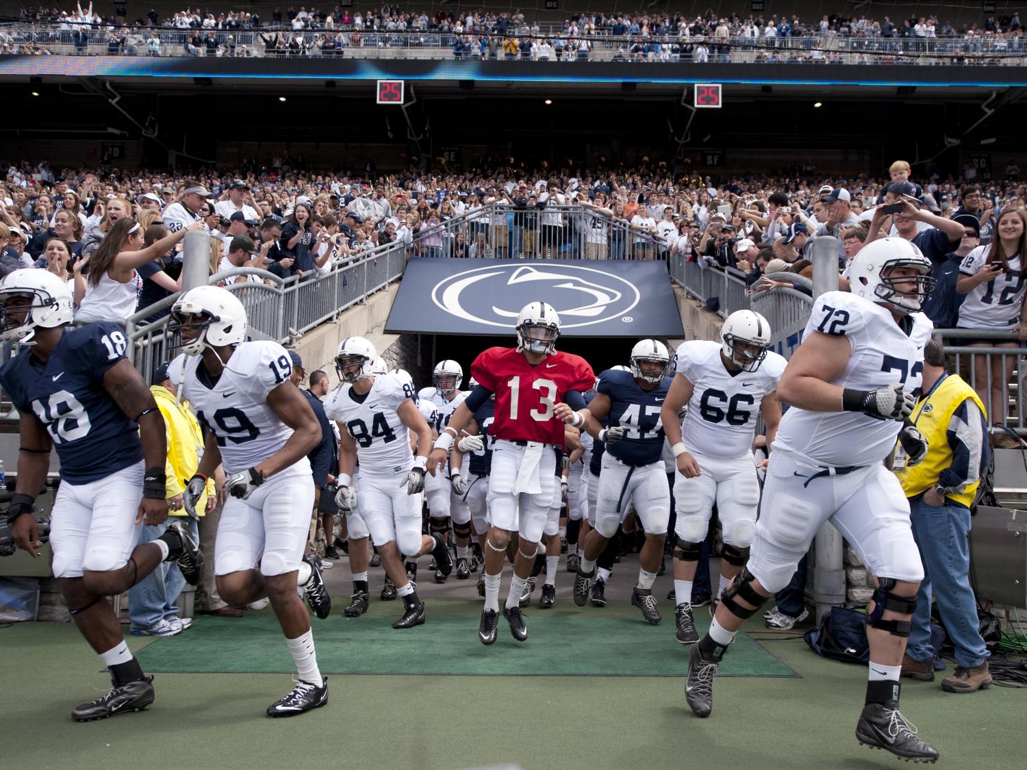 Penn State players run out to the field 