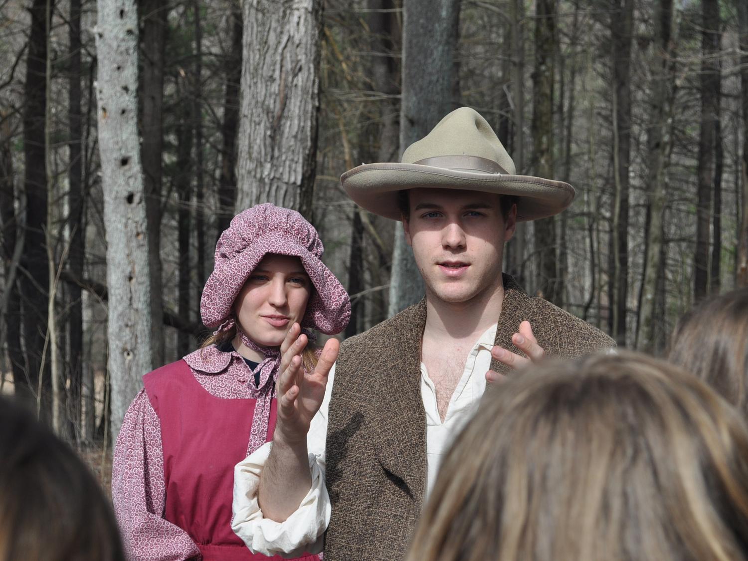 Costumed students explain maple syrup production