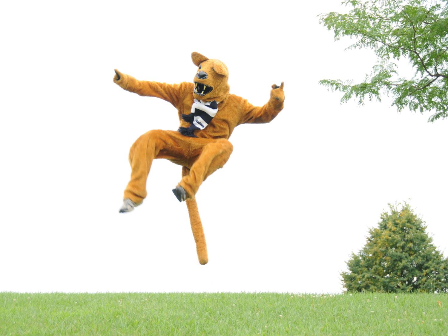 The Nittany Lion mascot jumps in the air on the Lehigh Valley campus