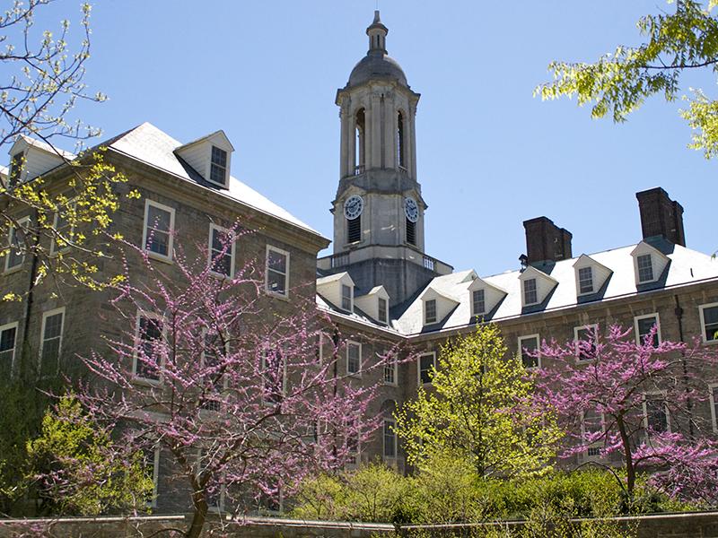Old Main with blooming trees