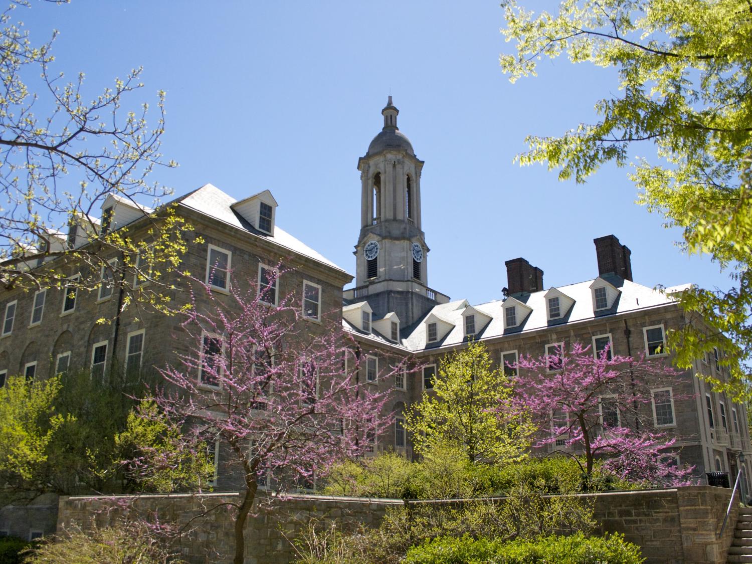 Old Main with foliage