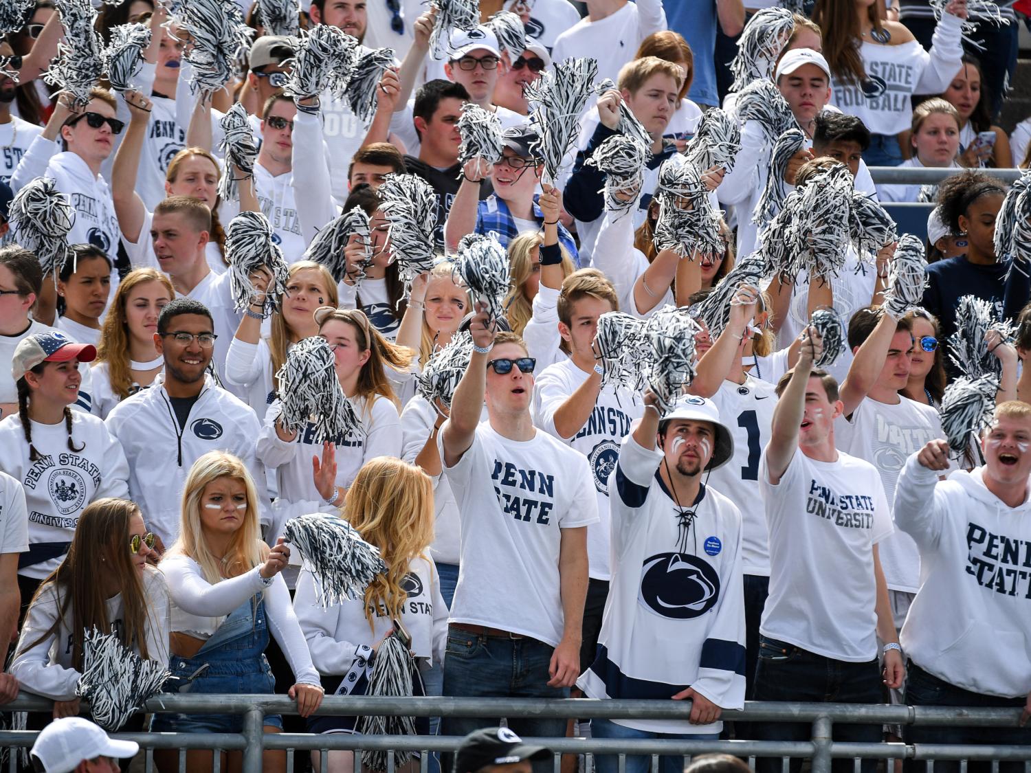 students cheering on Penn State football team at Beaver Stadium