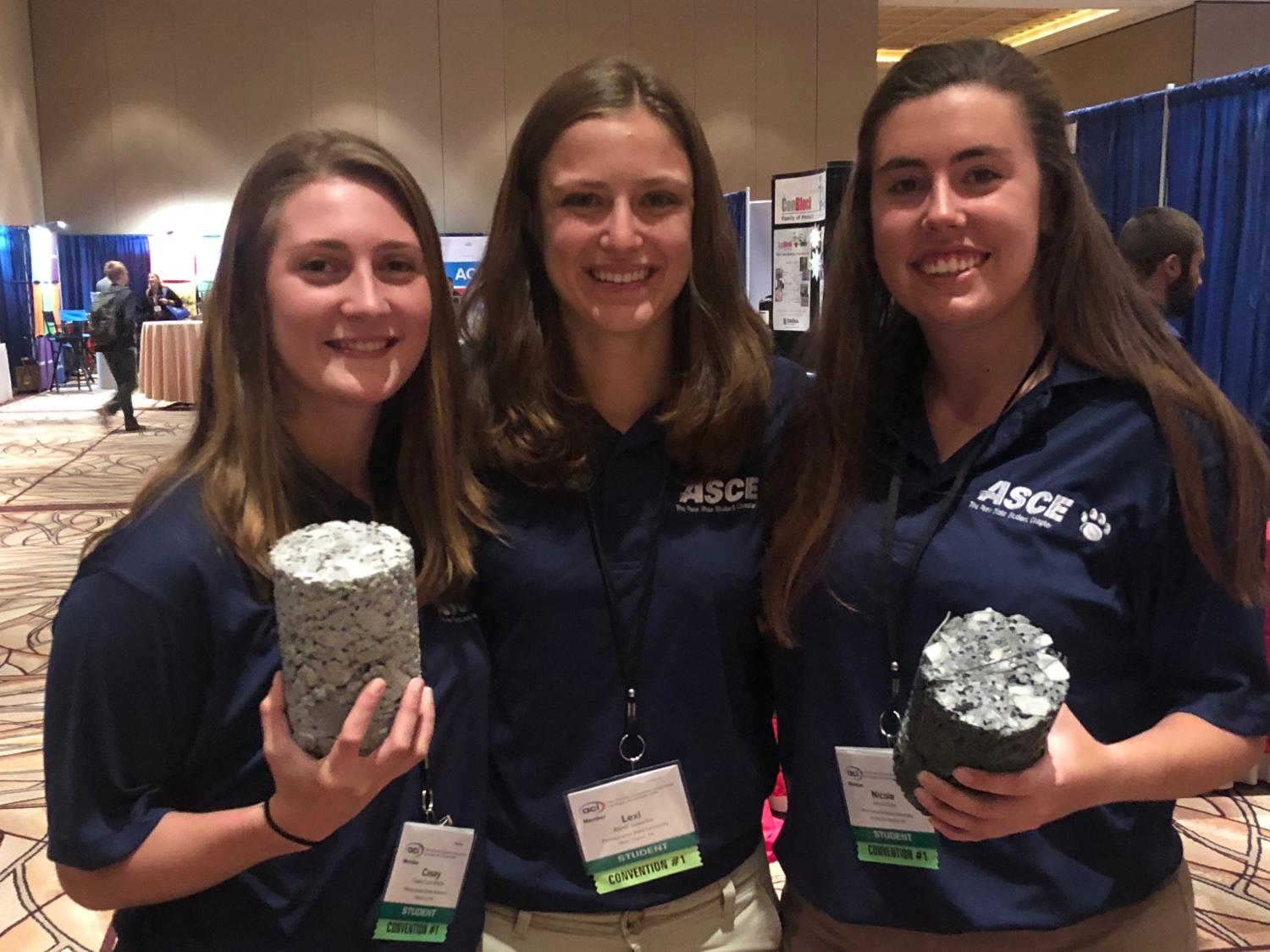 Team members pose with their concrete cylinders.