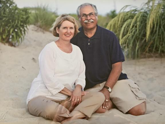 a photo of a couple on the beach