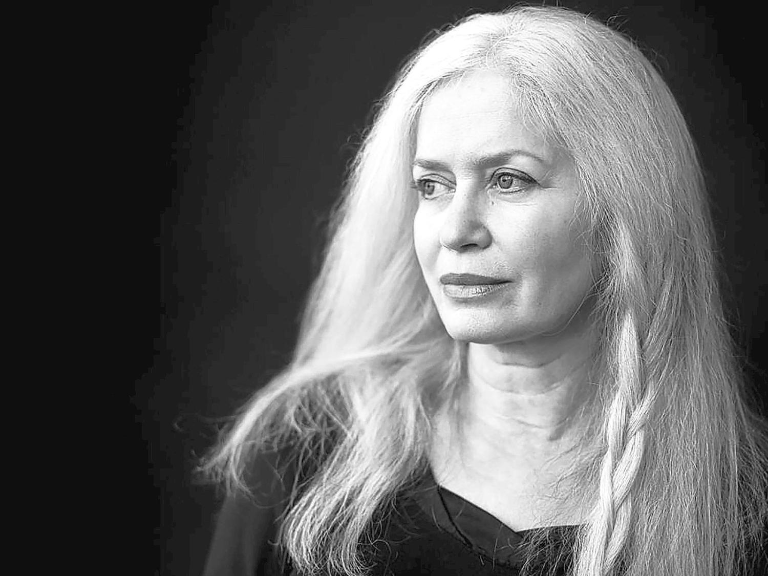 A black-and-white portrait of the author Amy Hempel