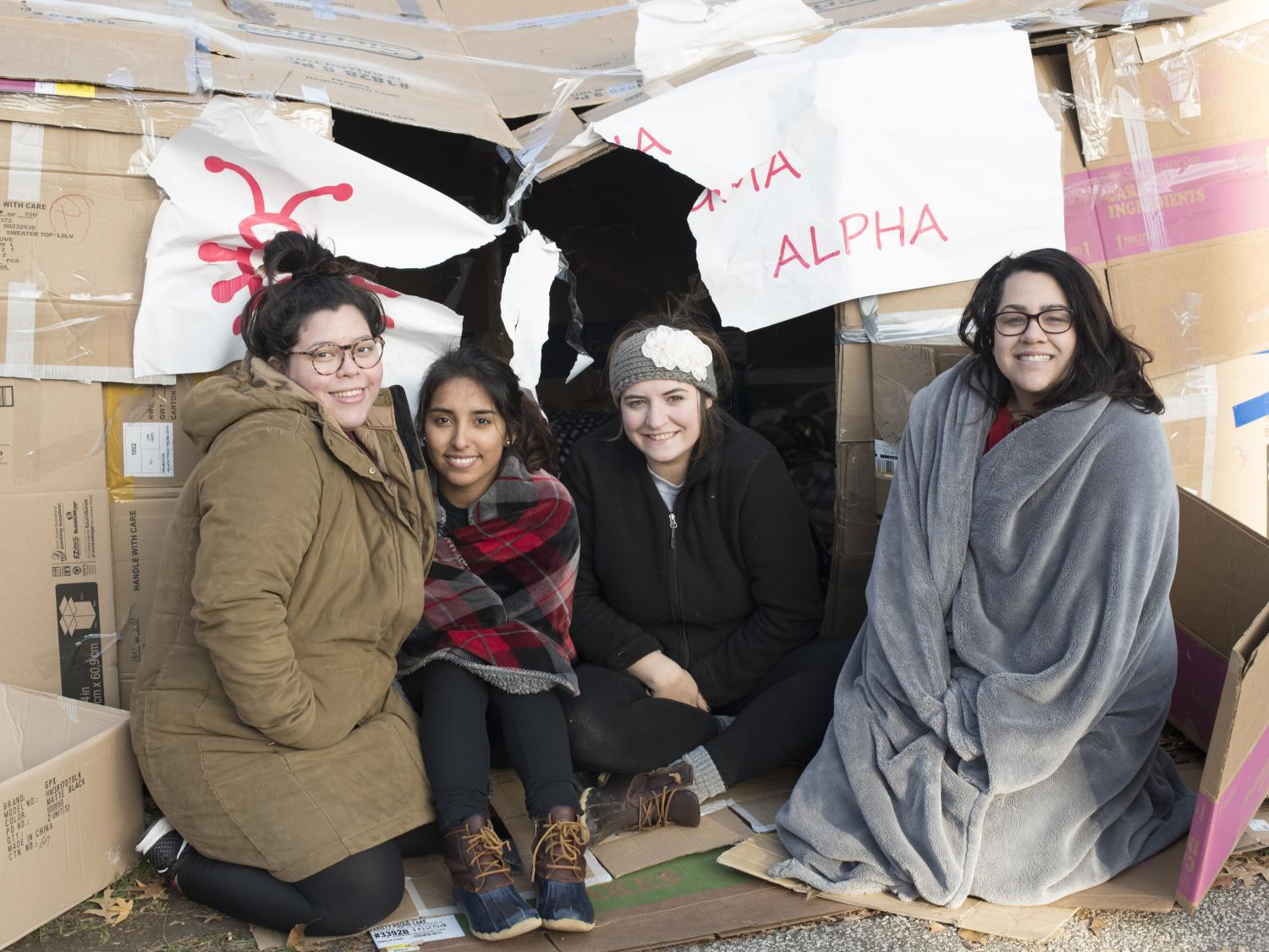 Andrea Gaez, Elisa Dehoyos, Nici Cortes and Sorya Nasir inside the home they stayed in for the Cardboard City fundraiser.