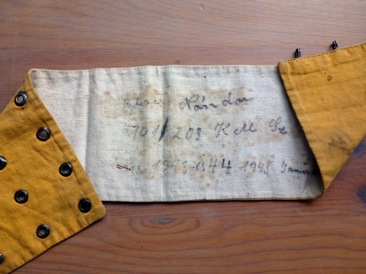 An armband worn by a Jewish man forced into slave labor by the German army during World War II