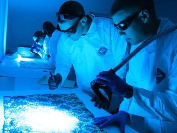 Students using a black light 
