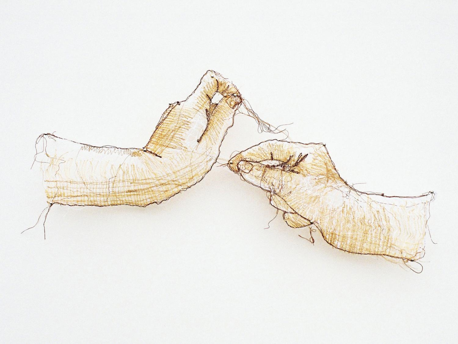 Embroidery artist Amanda McCavour’s “Hands” artwork.