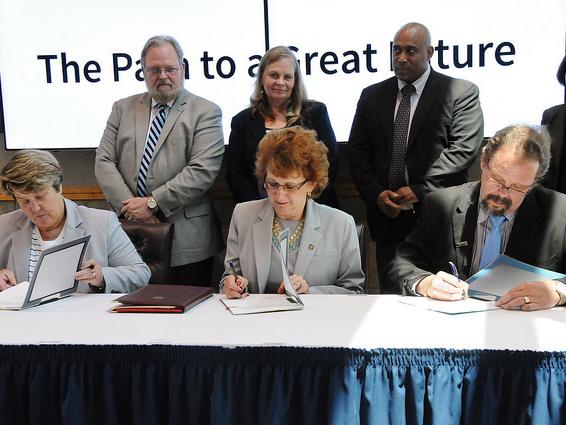Articulation agreement between Penn State and LCCC is signed at a press conference.