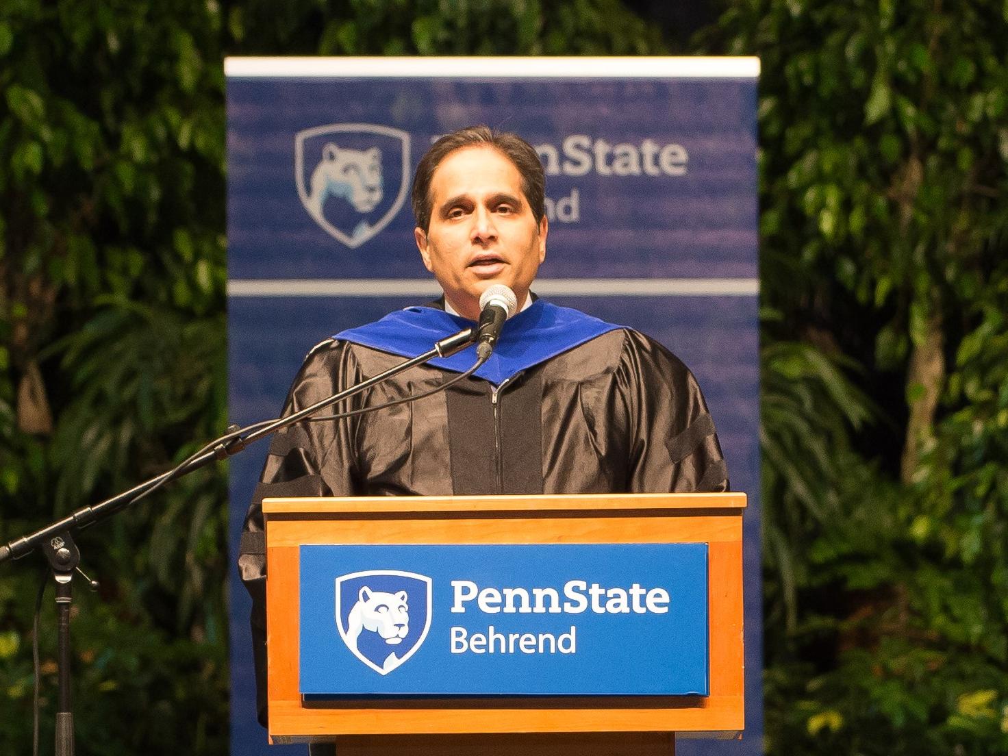 Ashutosh Deshmukh speaks during a Penn State Behrend commencement program.