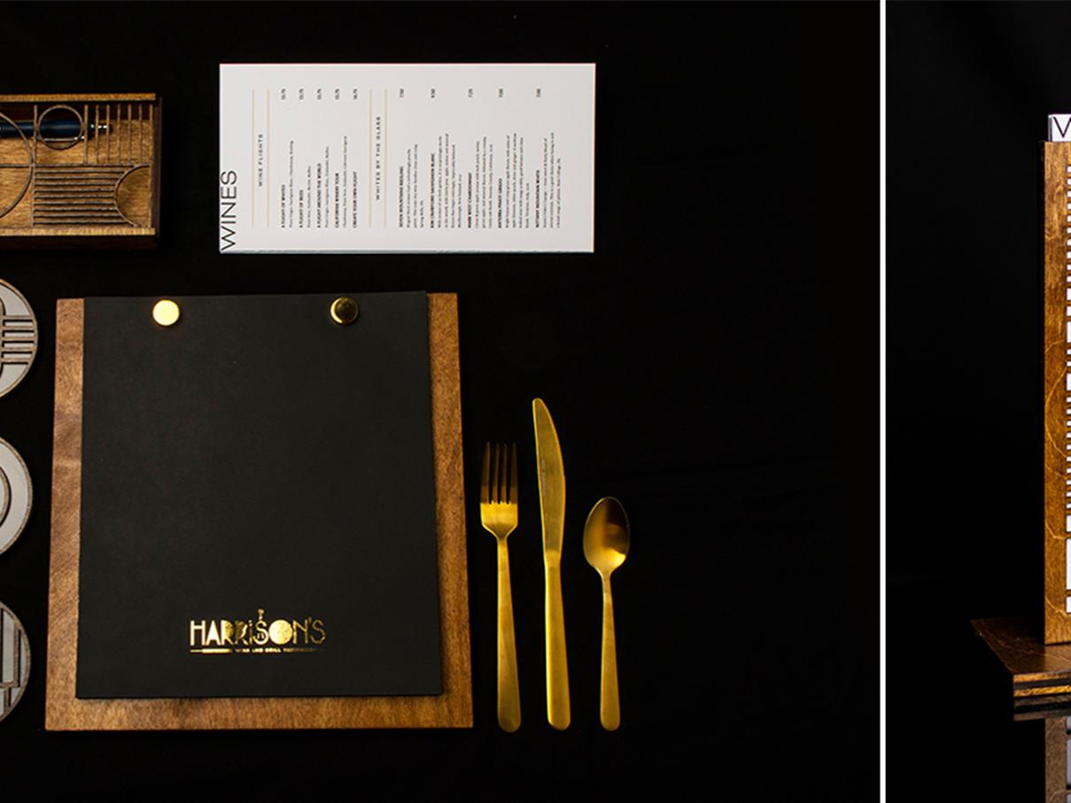 Restaurant table setting and wine list designs for a restaurant called Harrison's on a black background.