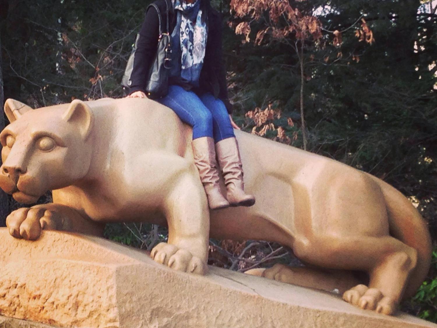 Penn State World Campus student Naby Baig visited the Nittany Lion Shrine when she came to campus in December 2013.