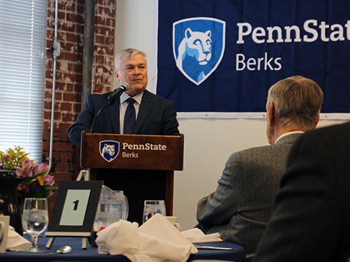 President Eric J. Barron addresses community leaders.