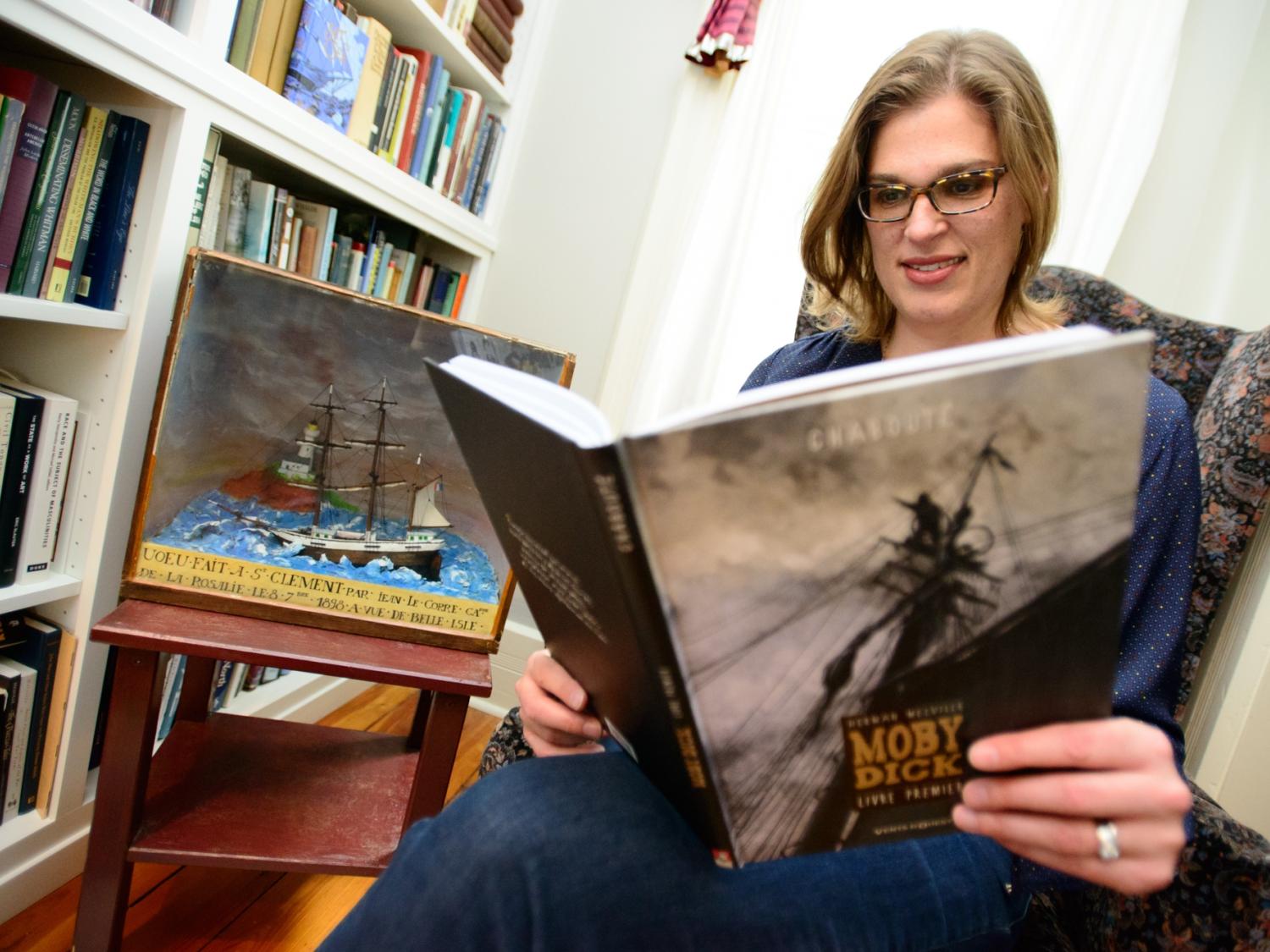 Hester Blum reads a large hardback copy of Herman Melville's Moby-Dick