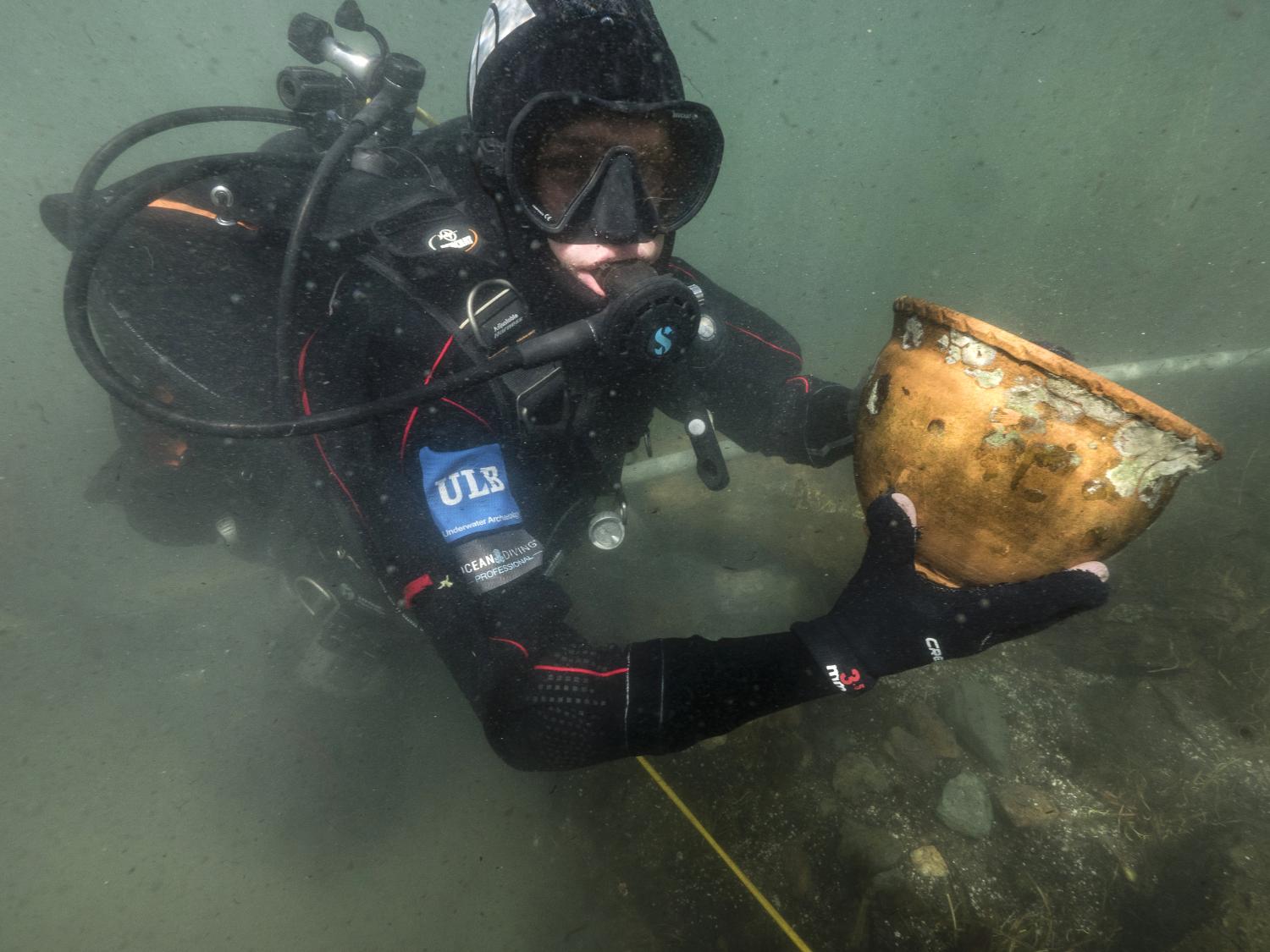 scuba diver with bowl