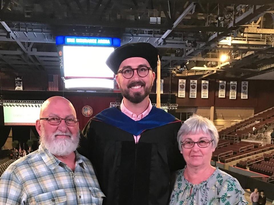 Brad Kovaleski with parents at Ph.D. graduation ceremony