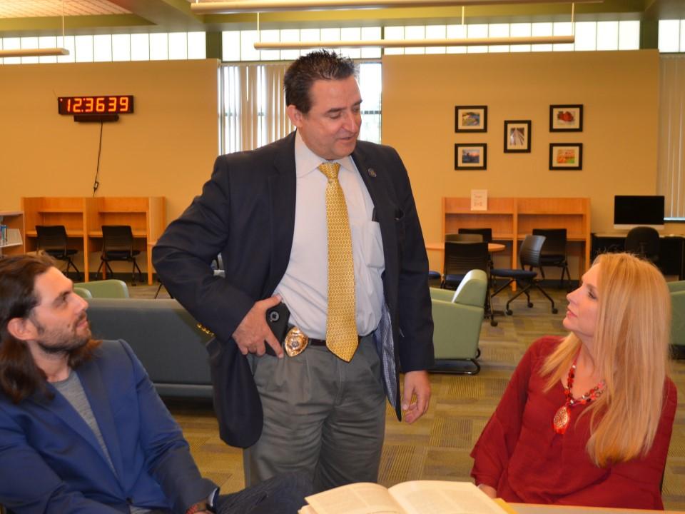 Shenango campus faculty talking with Daniel Pustinger from the PA Board of Probation and Parole at a recent workshop