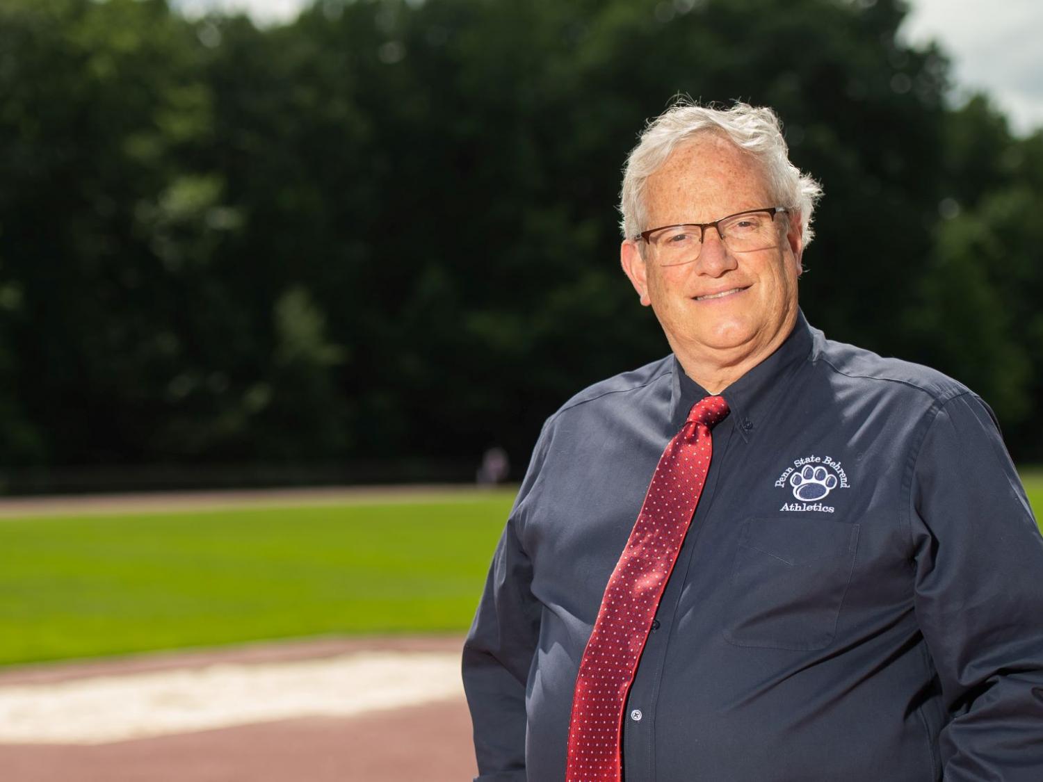 Brian Streeter, senior director of athletics, stands at the Penn State Behrend track.