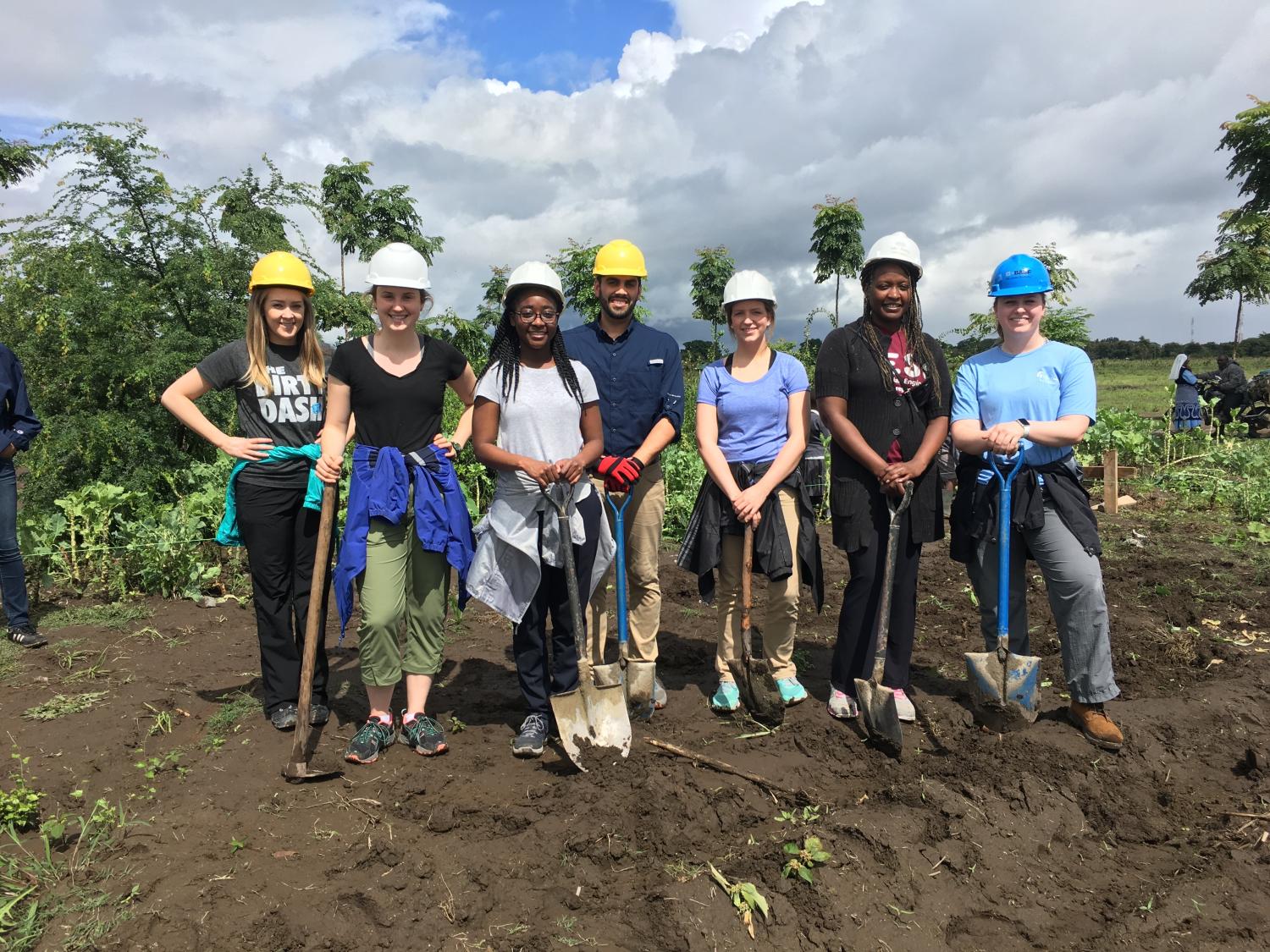 Penn State School of International Affairs student Briana Casey, third from right, in Tanzania alongside her team, including HESE Director Esther Obonyo, second from right.