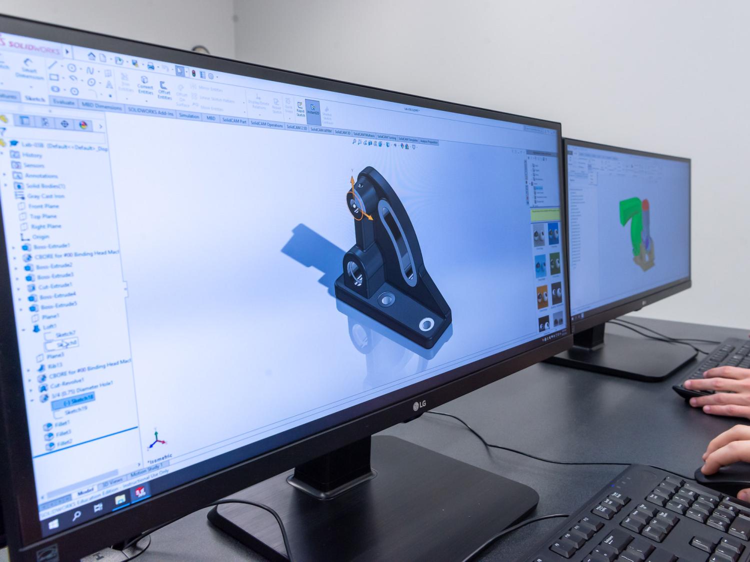 A monitor showing computer-aided design or CAD