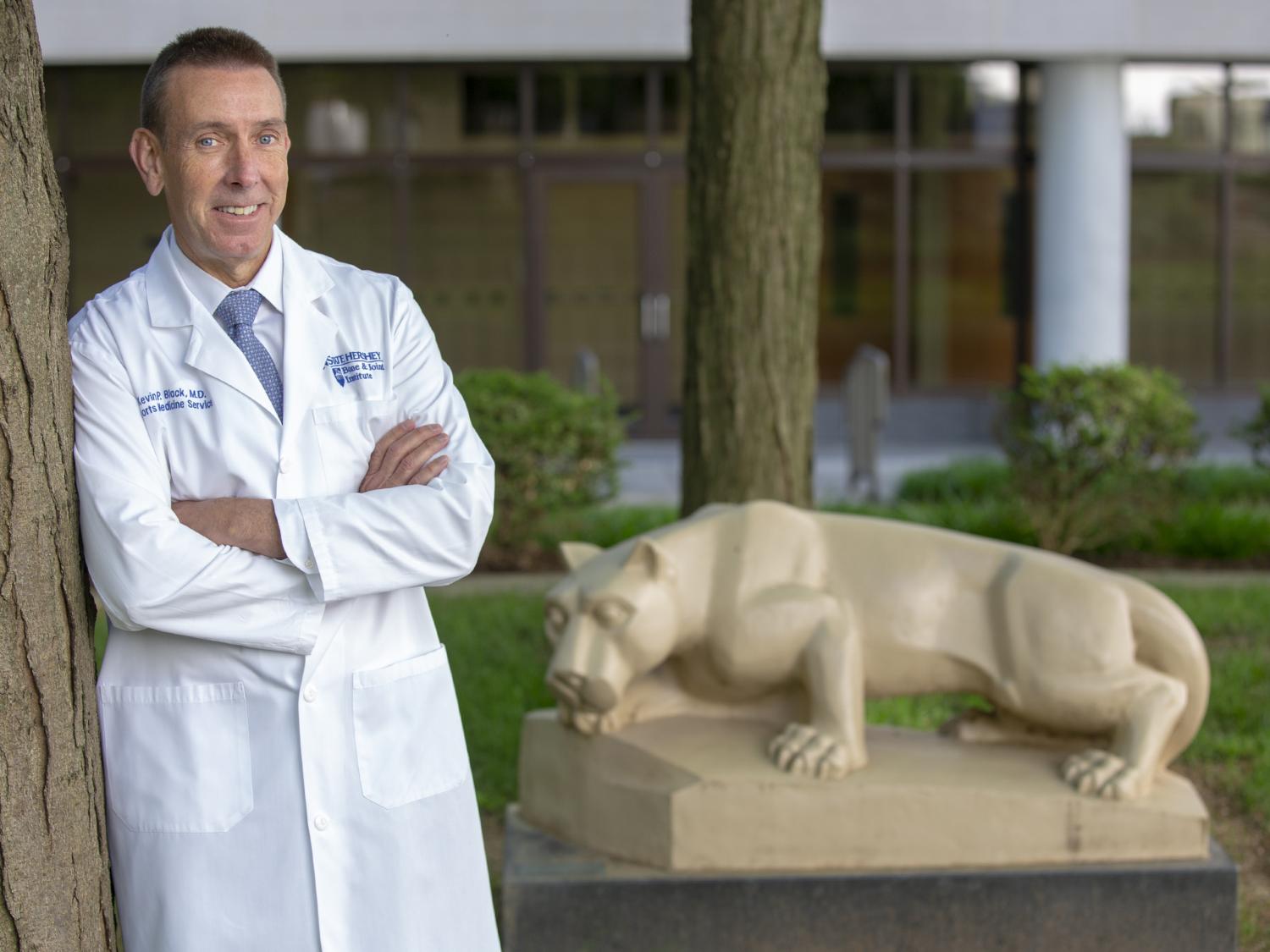 Kevin Black with lion shrine