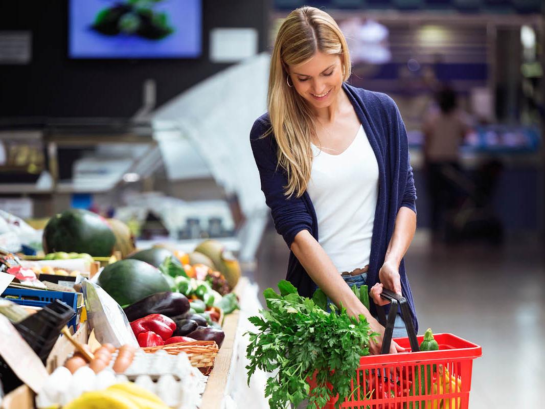 woman shopping for vegetables