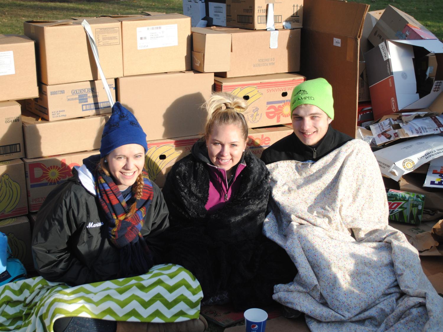 Marissa Knox, far left, Shelby Seidler and Jeremy Stonesifer were three participants in the Cardboard City fundraiser at Penn State Behrend.